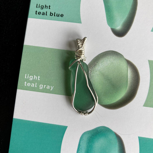 Light teal gray sea glass silver plated necklace